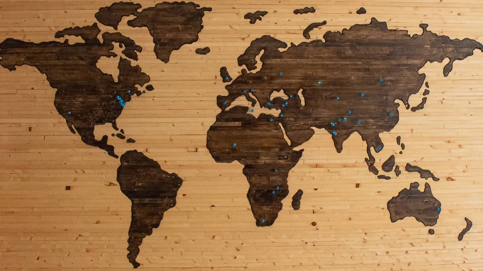 Map of the world screen-printed on wood