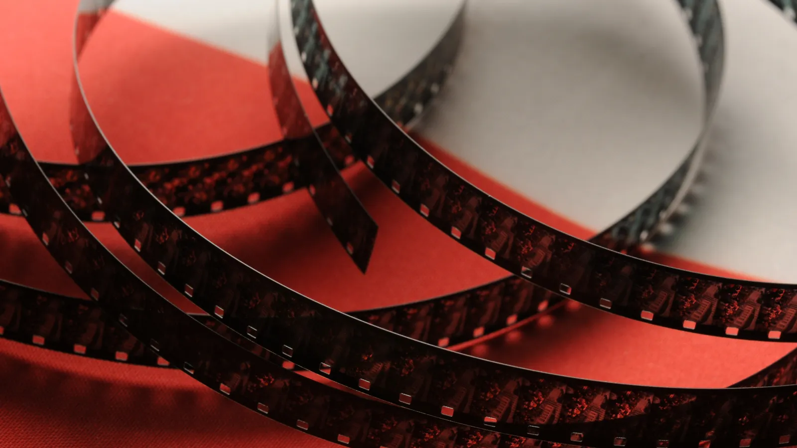 Film reel on top of a Polish flag