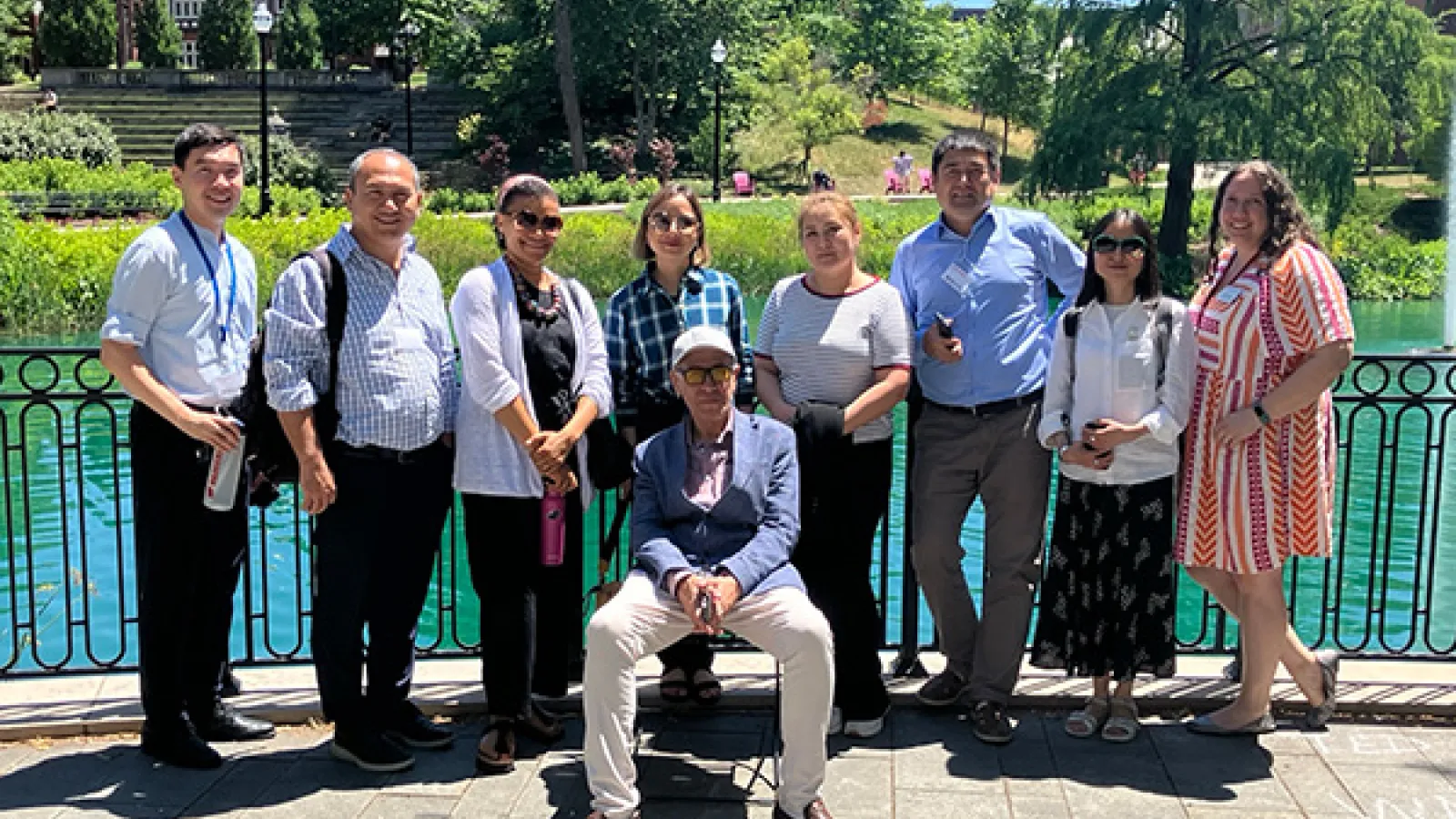 Group photo of the US-CARNET delegation and Ohio State faculty and staff in front of Mirror Lake