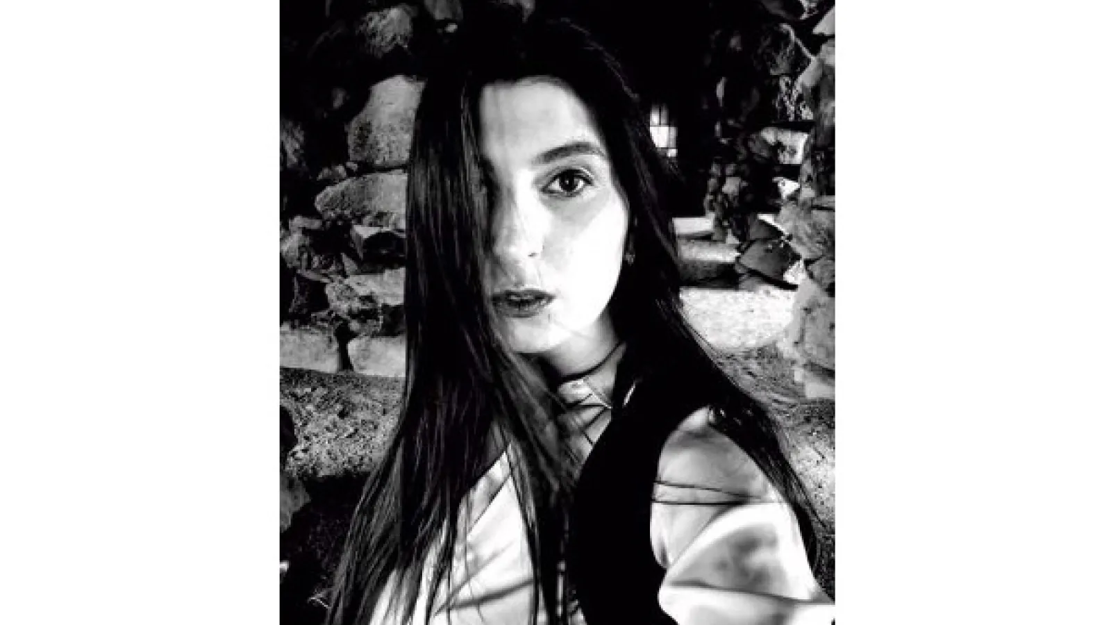 A black and white portrait of Ekaterina Derysheva