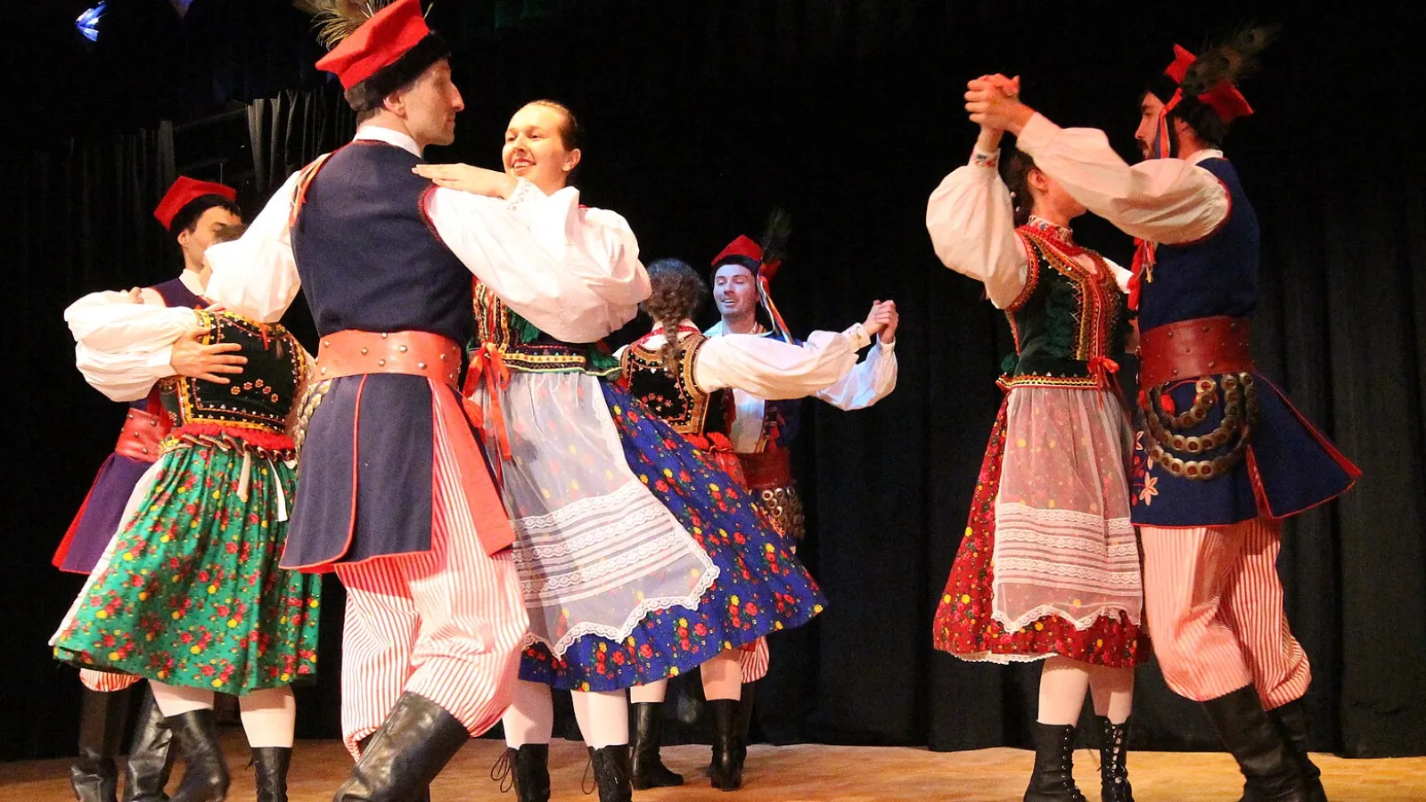 Polish folk dancers dancing the Krakowiak