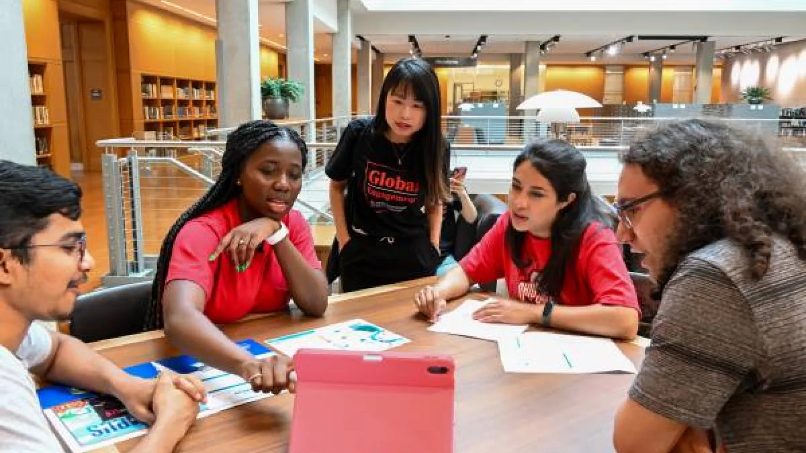 A group of students work together in Thompson Library