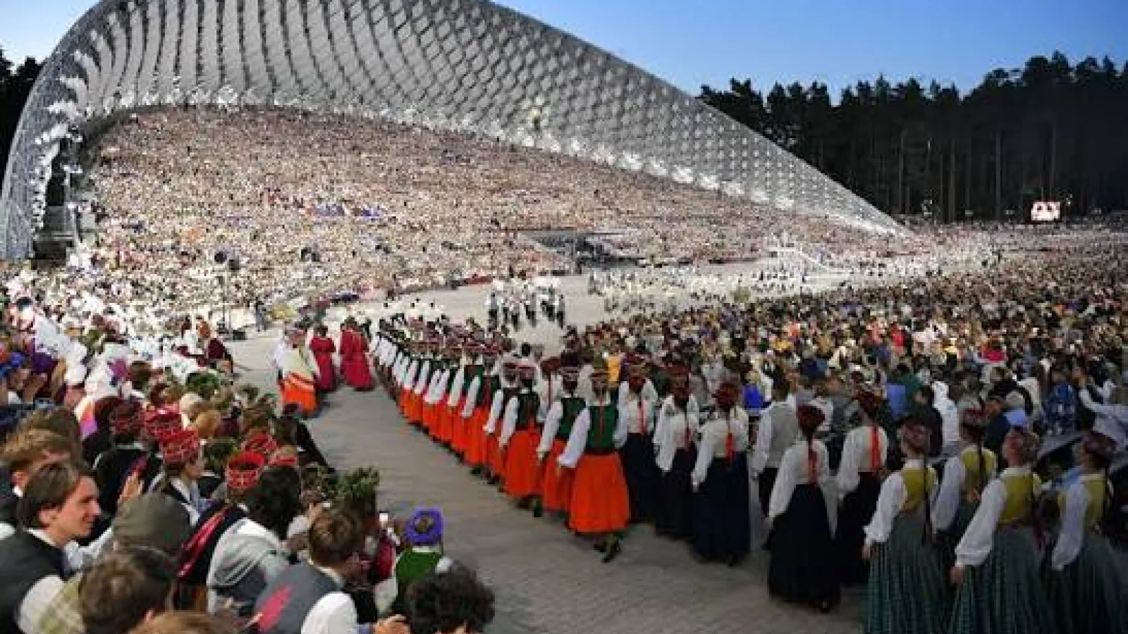 Performers and audiences members at the XXVII Nationwide Latvian Song and XVII Dance Festival