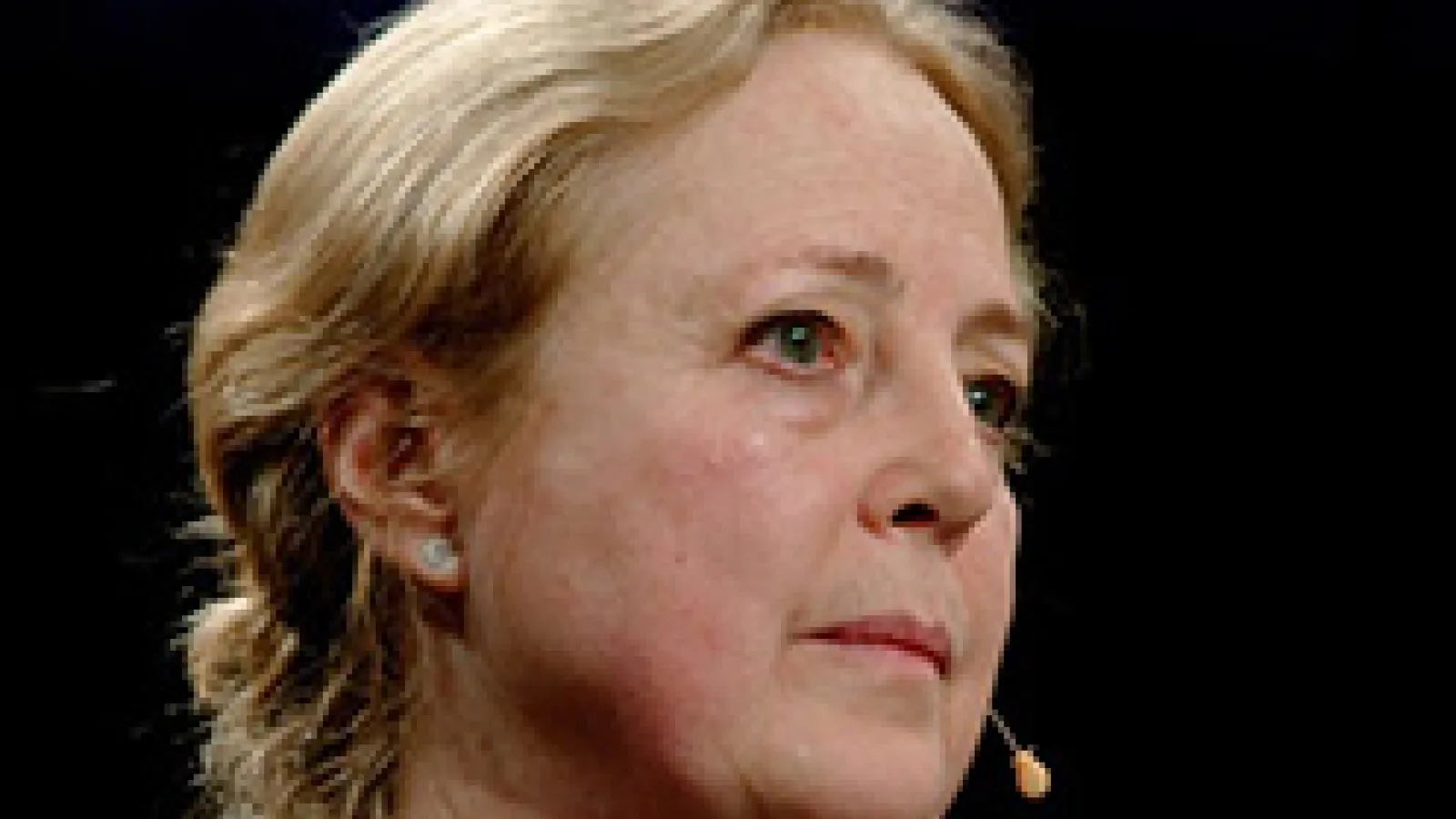 Face of a woman with a black background
