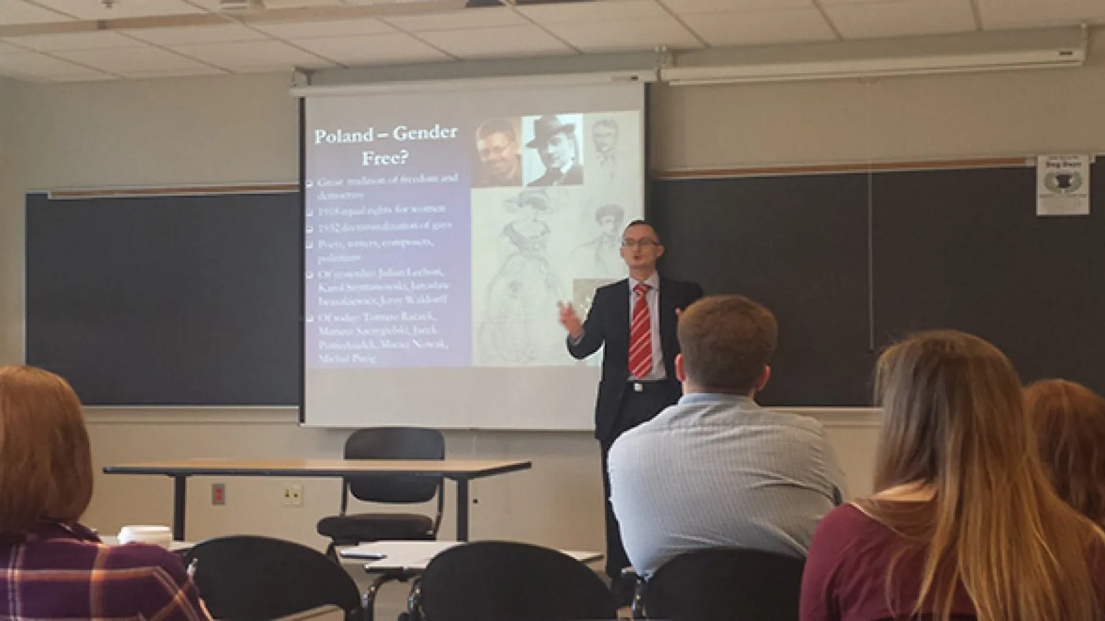 Man giving a lecture in classroom