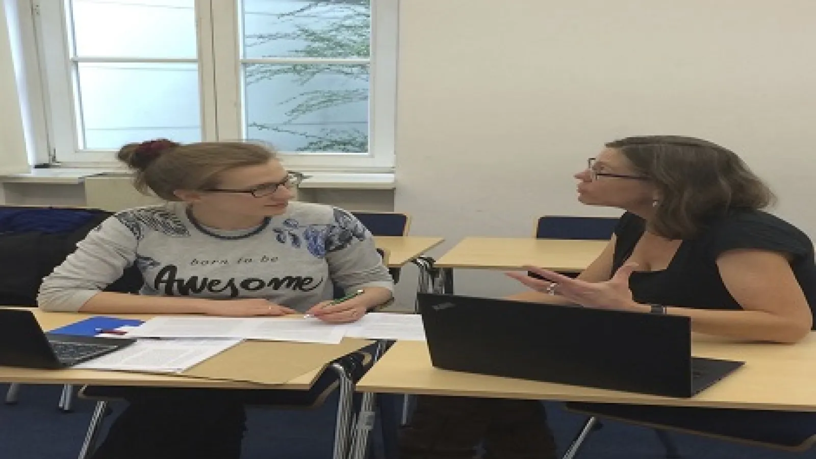 Dr. Brintlinger working with a student in Warsaw