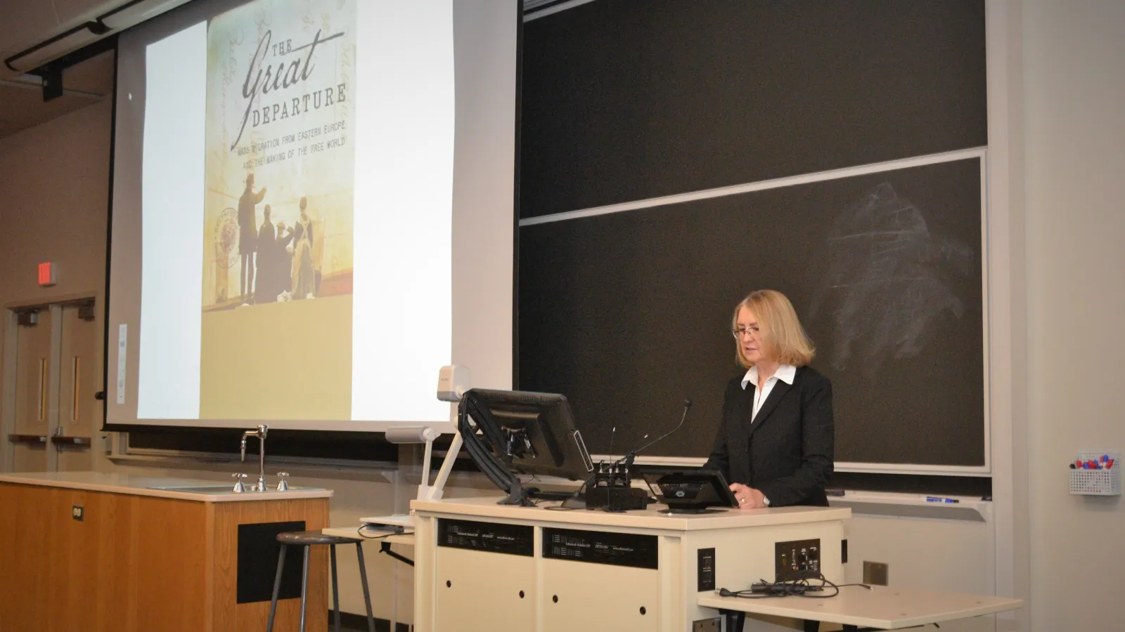 Jill Bystydzienski introducing the keynote speaker, Tara Zahra, at the 2018 Midwest Slavic Conference