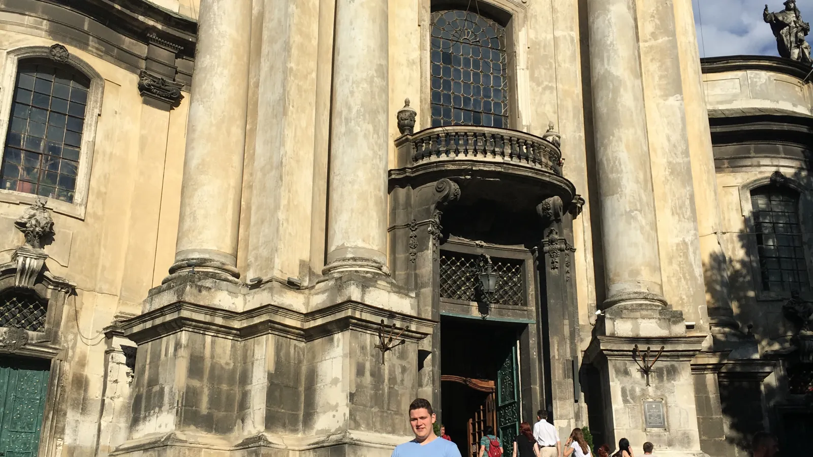 Jason Scheele in front of a church