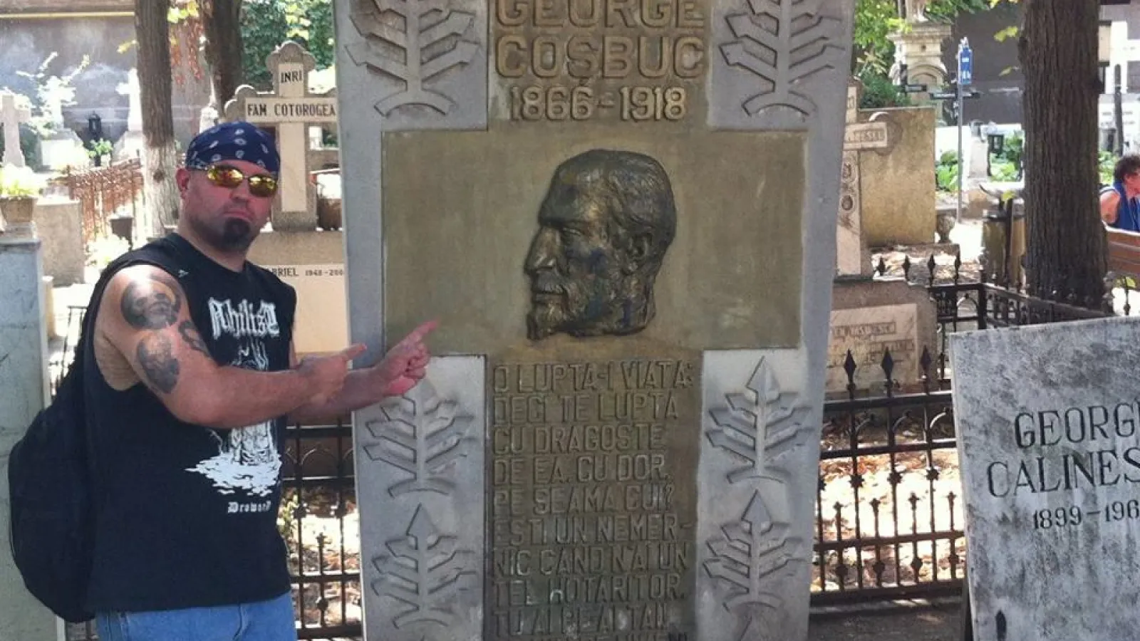 Justin next to George Cosbuc statue
