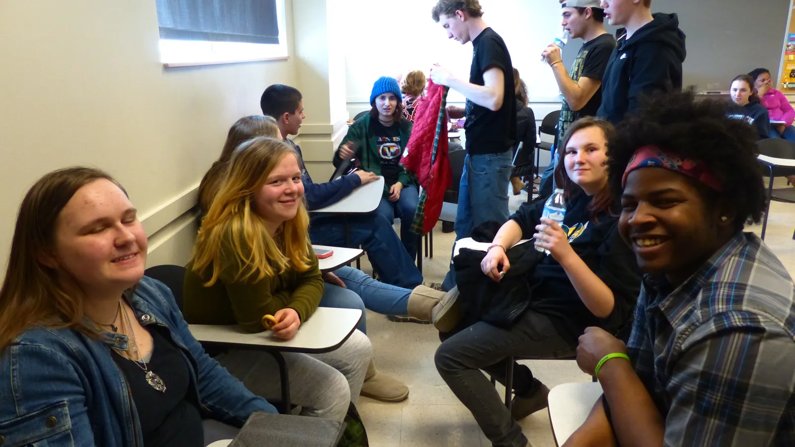 Students take a break between the commission of tasks at the Olympiada