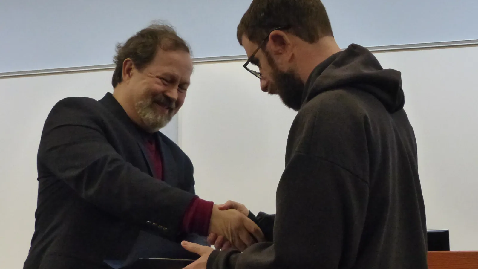 Russian Undergraduate Olympiada Winner Receiving Certificate