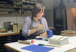 Julia Keblinska making a book at the Lodz Book Art Museum