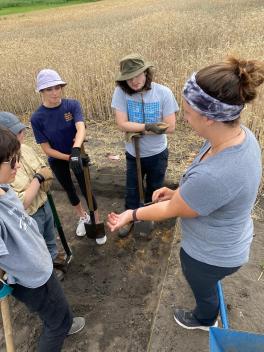 Lauren teaching students at the field school.