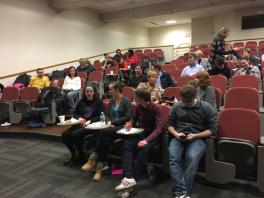 K12 Olympiada Participants Students sitting in seats in a large auditorium