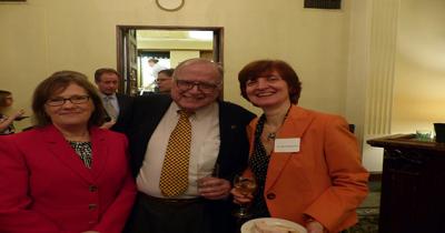 Professors Karen Dawisha, George Kalbouss, and Yana Hashamova A man standing with two women shoulder-to-shoulder
