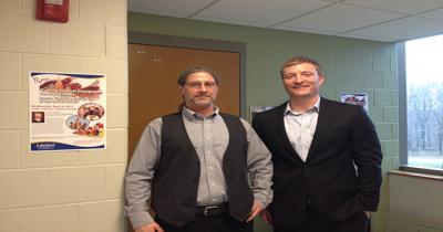 Director Eric Usatch (Center for International Education, Lakeland Communicy College) and Justin Wilmes Two men standing next to each other in a doorway