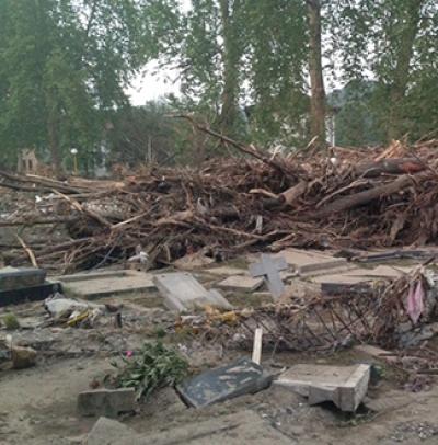 Flooded Village in Bosnia Debris from flood in a pile