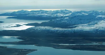 A distance shot of the mountains and a bay