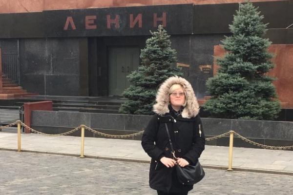 Alicia Baca standing in front of Lenin's mausoleum 