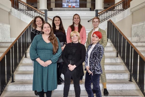 Ohio State olympiada volunteers standing on stairs inside of Bowling Green State .'s University hall. (Top row, left to right: Lilia Caserta, Lejla Veskovic, Siobhan Seigne, Michelle Verbitskaya Bottom row, left to right: Emma Pratt, Alicia Baca, Aleksandra Shubina