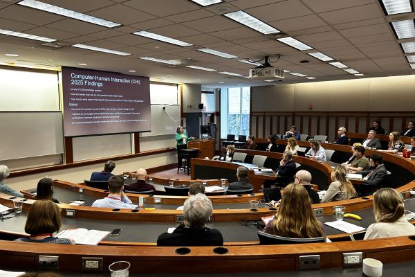 Dr. Molly Blasing presenting at the Saturday plenary panel.