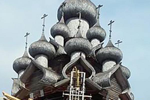 Grey wooden onion domes of an Orthodox church