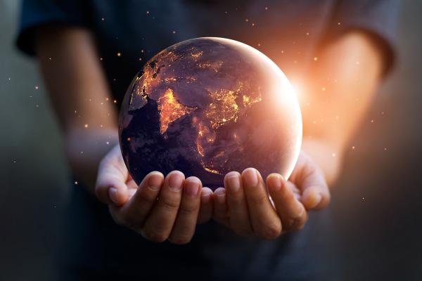 child holding polluted planet Earth child holding polluted planet Earth