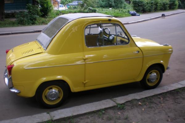 French car Bright yellow, two seater older car