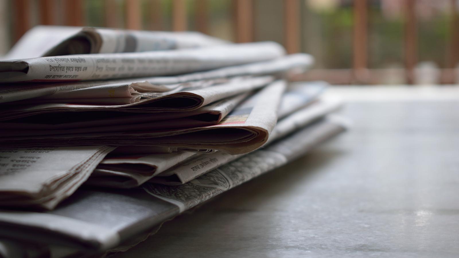 Newspapers on a table. Photo by brotiN biswaS from Pexels