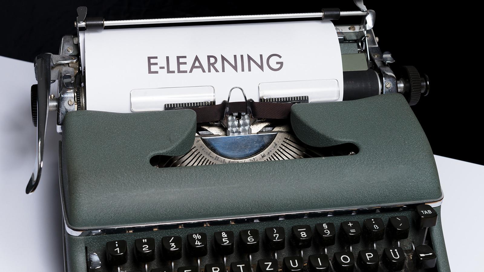 A typewriter with a piece of paper that says elearning