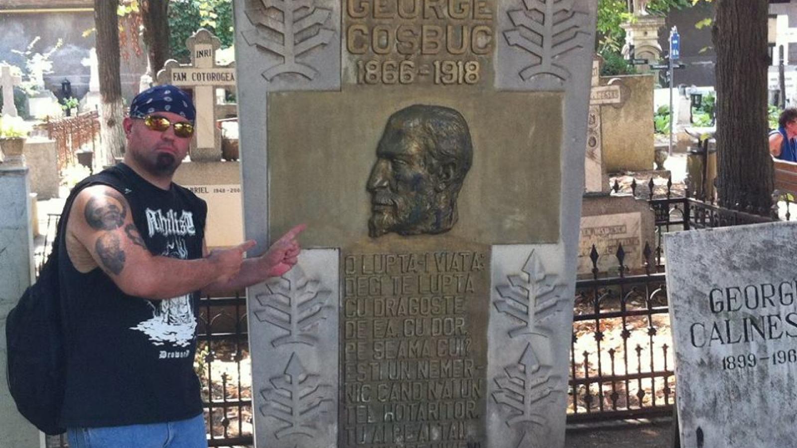 Justin next to George Cosbuc statue