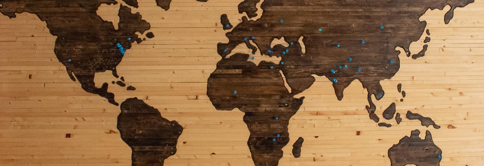 Map of the world screen-printed on wood