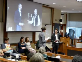 Students performing Act I of Jakub Ruda in an amphitheater style room