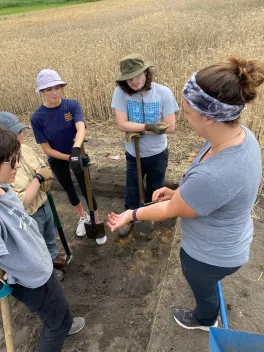 Lauren teaching students at the field school.