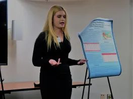 Michelle McKenzie presenting at the undergraduate poster forum
